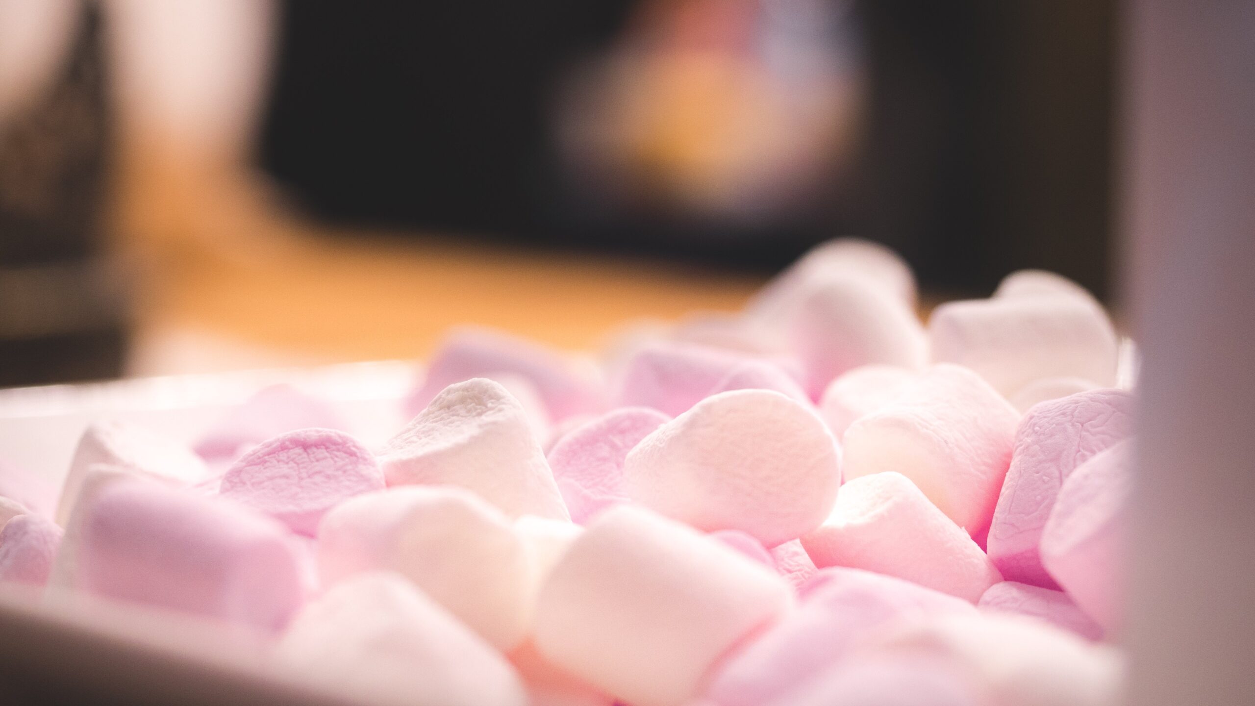A bowl of pink marshmallows.